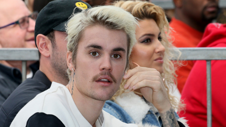 HOLLYWOOD, CALIFORNIA - JANUARY 23: Justin Bieber (L) and Tori Kelly (R) attend an event honoring Sir Lucian Grainge with a star on the Hollywood Walk of Fame on January 23, 2020 in Hollywood, California. (Photo by David Livingston/Getty Images)