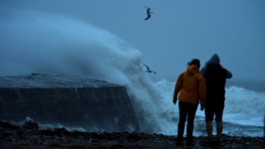LYME REGIS, ENGLAND, - FEBRUARY 09: Storm Ciara arrives with waves hitting the Cobb on February 09, 2020 in Lyme Regis, United Kingdom. Amber weather warnings are in place as gusts of up to 90mph and heavy rain sweep across the UK with travellers facing disruption from Storm Ciara. (Photo by Finnbarr Webster/Getty Images)