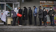 BEIJING, CHINA - FEBRUARY 02: Chinese residents line up to get a free protective mask at a local pharmacy on February 2, 2020 in Beijing, China. The number of cases of a deadly new coronavirus rose to more than 17000 in mainland China on Monday, days after the World Health Organization (WHO) declared the outbreak a global public health emergency. China continued to lock down the city of Wuhan in an effort to contain the spread of the pneumonia-like disease which medicals experts have confirmed can be passed from human to human. In an unprecedented move, Chinese authorities have put travel restrictions on the city which is the epicentre of the virus and neighbouring municipalities affecting tens of millions of people. The number of those who have died from the virus in China climbed to at least 360 on Monday, mostly in Hubei province, with the first known death outside of China reported in the Philippines. Cases have been reported in other countries including the United States, Canada, Australia, Japan, South Korea, India, the United Kingdom, Germany, France and several others. The World Health Organization has warned all governments to be on alert and screening has been stepped up at airports around the world. (Photo by Kevin Frayer/Getty Images)