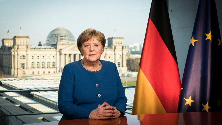 This Handout photo made available by the German government's press office shows German Chancellor Angela Merkel posing for a photo at the recording of a TV address to the nation on the spread of the new coronavirus COVID-19 at the Chancellery, with a view of the Reichstag, the building housing the lower house of parliament, through the window in Berlin on March 18, 2020., Image: 507569463, License: Rights-managed, Restrictions: RESTRICTED TO EDITORIAL USE - MANDATORY CREDIT "AFP PHOTO / BUNDESREGIERUNG / STEFFEN KUGLER " - NO MARKETING - NO ADVERTISING CAMPAIGNS - DISTRIBUTED AS A SERVICE TO CLIENTS - NO ARCHIVES, Model Release: no, Credit line: Steffen Kugler / AFP / Profimedia