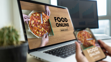 Close up woman ordering food online by internet Concept order food