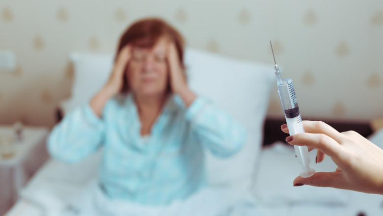 Pensioner woman in bed got syringe.