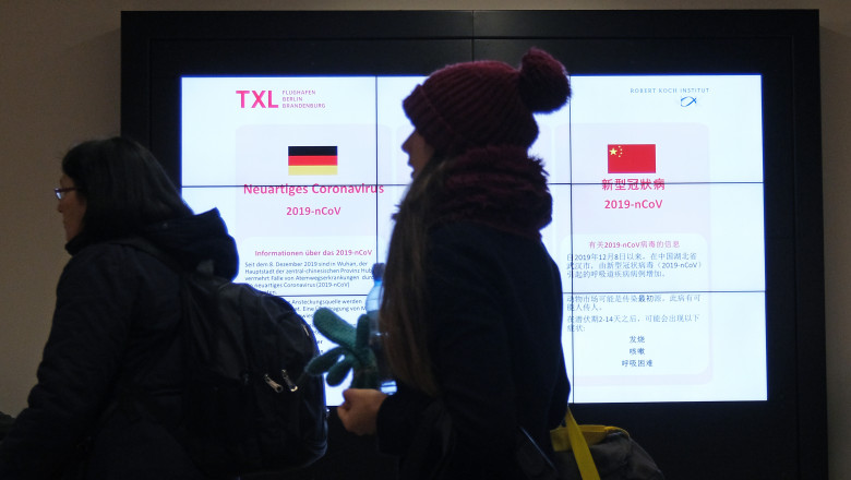 BERLIN, GERMANY - JANUARY 29: A monitor shows information regarding the new coronavirus at Tegel Airport on January 29, 2020 in Berlin, Germany. So far Germany has confirmed four cases of the virus, all in the state of Bavaria. The afflicted are all employees of Webasto, a German car roof manufacturer with manufacturing centers in China, who likely contracted the virus from a Chinese colleague. (Photo by Sean Gallup/Getty Images)