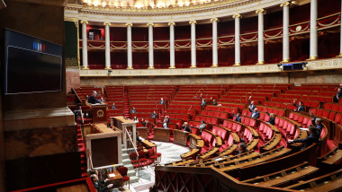 Deputies raise their hands and vote on an emergency law to face the spread of the COVID-19 infection caused by the novel coronavirus at the French National Assembly in Paris on March 22, 2020., Image: 508556045, License: Rights-managed, Restrictions: , Model Release: no, Credit line: Ludovic MARIN / AFP / Profimedia
