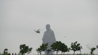 An Indian airforce helicopter flies over the Statue Of Unity, the world's tallest statue, in Kevadiya some 200 kms from Ahmedabad in India's western Gujarat state on on September 17, 2019., Image: 471400091, License: Rights-managed, Restrictions: , Model Release: no, Credit line: SAM PANTHAKY / AFP / Profimedia