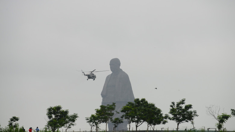 An Indian airforce helicopter flies over the Statue Of Unity, the world's tallest statue, in Kevadiya some 200 kms from Ahmedabad in India's western Gujarat state on on September 17, 2019., Image: 471400091, License: Rights-managed, Restrictions: , Model Release: no, Credit line: SAM PANTHAKY / AFP / Profimedia