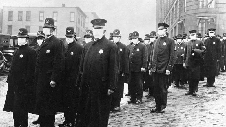 oameni cu măști în timpul pandemiei de gripă spaniolă din 1918