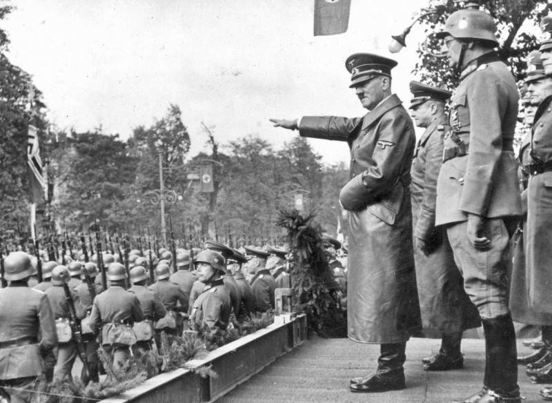 Adolf Hitler receives a parade of German troops in Aleje Ujazdowskie in Warsaw. Also visible: General Gunther von Kluge (2 on the left), General Maximilian von Weichs (on the helmet), General Fedor von Bock (2 on the right), 5 October 1939