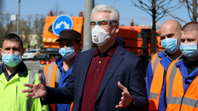 MOSCOW, RUSSIA - MAY 1, 2020: Moscow Mayor Sergei Sobyanin (C) during a meeting with drivers of street washing vehicles. Moscow carries out a disinfection of roads, pavements, parking lots and public spaces. Over 70,000 utility workers and over 4,500 machines are involved in the disinfection works. Vladimir Gerdo/TASS, Image: 516318231, License: Rights-managed, Restrictions: , Model Release: no, Credit line: Vladimir Gerdo / TASS / Profimedia