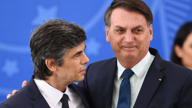 (FILES) In this file photo taken on April 17, 2020 Brazilian President Jair Bolsonaro (R) embraces his new Health Minister Nelson Teich -in replacement of Luiz Henrique Mandetta, who had several disagreements with Bolsonaro in conducting the fight against the COVID-19- during his taking in ceremony at Planalto Palace in Brasilia. Teich resigned on May 15, 2020 due to "incompatibilities" with Bolsonaro, official sources informed., Image: 519651971, License: Rights-managed, Restrictions: , Model Release: no, Credit line: EVARISTO SA / AFP / Profimedia