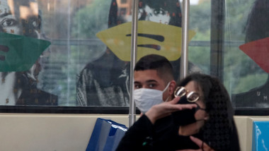 View of the Brazilian artist Alex Flemming work "Estacao Sumare" artistically tapped with face masks on top of the portrayed faces to warn about the importance of using protective face masks, to prevent the spread of the new coronavirus, COVID-19, at the Sumare subway station, in Sao Paulo, Brazil, on May 10, 2020. - Flemming's artistic installation, inaugurated in 1998, consists of 44 panels 1.75 meters high by 1.25 meters wide, and portrays all the racial diversity of the city of Sao Paulo with anonymous people who seem to observe the movement of the subway station. Coronavirus Covid-19 outbreak, Sao Paulo, Brazil - 10 May 2020, Image: 518565148, License: Rights-managed, Restrictions: , Model Release: no, Credit line: Cris Faga / Shutterstock Editorial / Profimedia