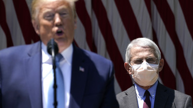 WASHINGTON, DC - MAY 15: U.S. President Donald Trump is flanked by Dr. Anthony Fauci, director of the National Institute of Allergy and Infectious Diseases while speaking about coronavirus vaccine development in the Rose Garden of the White House on May 15, 2020 in Washington, DC. Dubbed "Operation Warp Speed," the Trump administration is announcing plans for an all-out effort to produce and distribute a coronavirus vaccine by the end of 2020. (Photo by Drew Angerer/Getty Images)