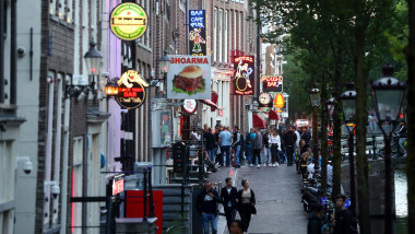 AMSTERDAM, NETHERLANDS - JULY 01: A general view of the Red Light District as it reopens after the Coronavirus or Covid19 Lockdown on July 01, 2020 in Amsterdam, Netherlands. Prime Minister of the Netherlands Mark Rutte announced that sex workers could officially return to work from July 1 but with strict rules about face-to-face contact, hygiene and making clients check for symptoms. (Photo by Dean Mouhtaropoulos/Getty Images)