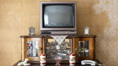 Old fashioned interior - vintage television set on stand