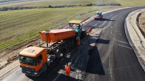 Licitații trucate la CNAIR: Nouă companii de asfaltare sunt investigate de Consiliul Concurenței