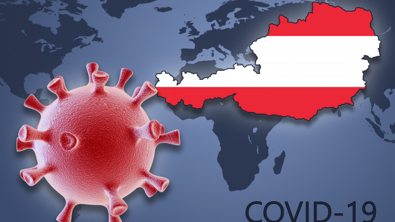 harta austriei in culorile drapelului cu coronavirus langa ea