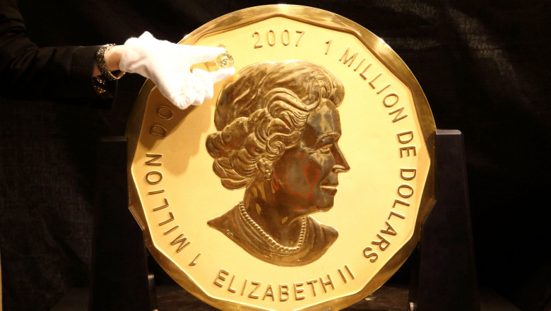 moneda de aur de 100 de kg cu chipul reginei Elisabeta a II-a