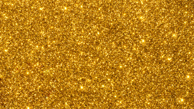 Gold shimmering glitter for texture or background