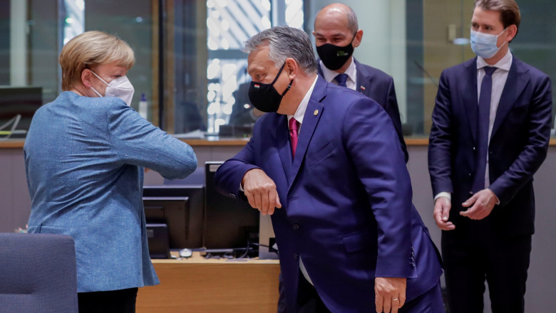 Angela Merkel și Viktor Orban se salută înaintea Consiliului European