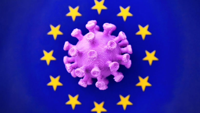 virusul roz în cercul stelelor din steagul UE