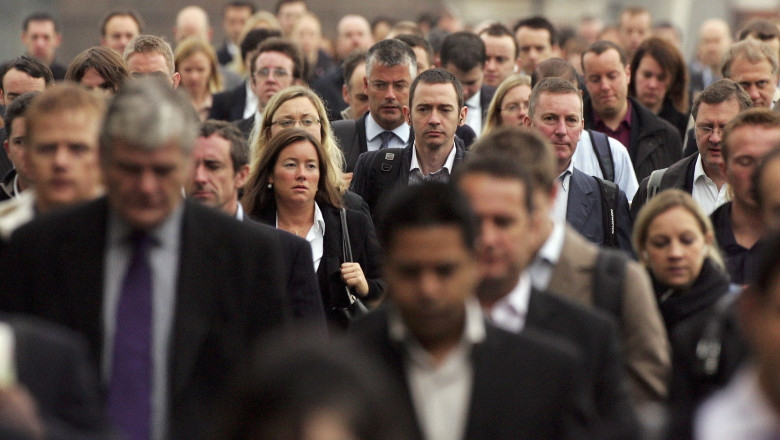 Commuters Flock To Work In The City Of London
