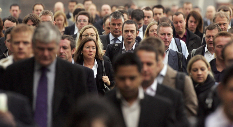 Commuters Flock To Work In The City Of London