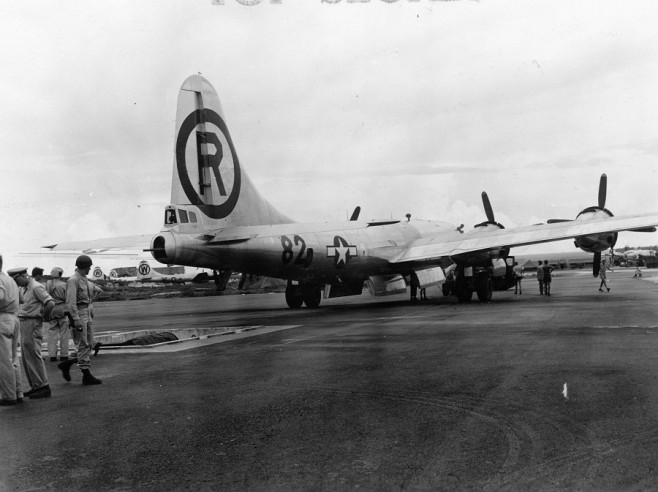 once-little-boy-is-ready-the-enola-gay-a-boeing-b-29-superfortress-bomber-is-reversed-and-positioned-over-the-trench