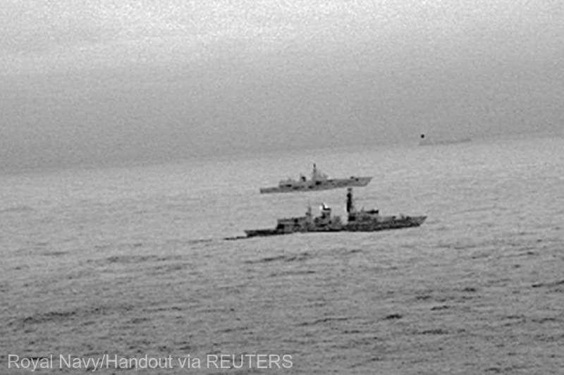 Images from an infrared camera on a helicopter show Royal Navy frigate HMS St Albans escorting Russian warship Admiral Gorshkov as it passes close to UK territorial waters through the North Sea in an image from an infrared camera on a helicopter handed out