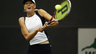 Maria Sharapova returns a shot