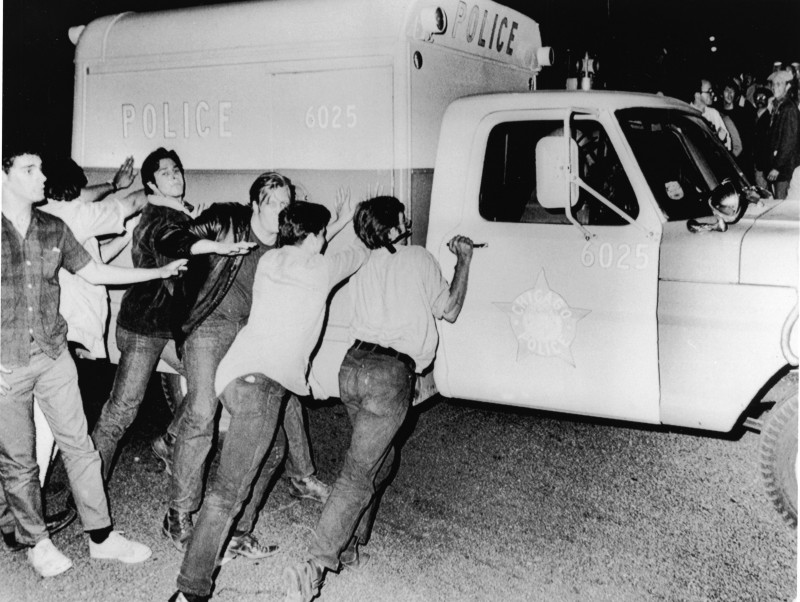 Protestors Push Police Vehicle At 1968 Democratic National Convention