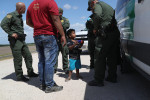 Border Patrol Agents Detain Migrants Near US-Mexico Border