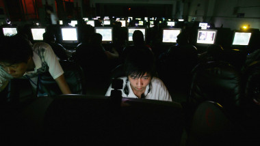 Chinese Youngers Play Online Games At An Internet Cafe In Wuhan
