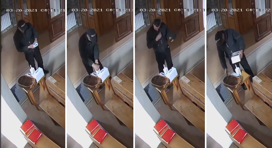 Hoț filmat cum își dezinfectează mâinile și-și face cruce în biserică, înainte de a fura banii din cutia milei VIDEO