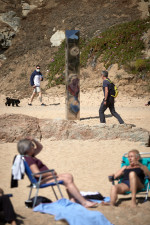 A metallic monolith appears on a beach in Catalonia