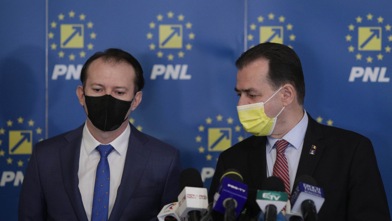 Florin Cîțu și Ludovic Orban fac declarații la Parlament.