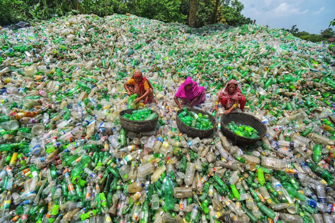 Workers at a recycling centre in Bogra, Bangladesh - 26 Jul 2018