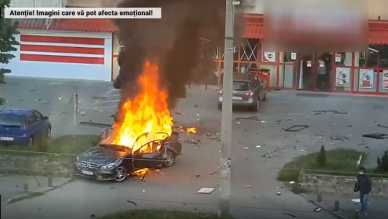 masina in flacari a omului de afaceri ioan crisan, dupa explozia din parcarea unui supermarket din arad