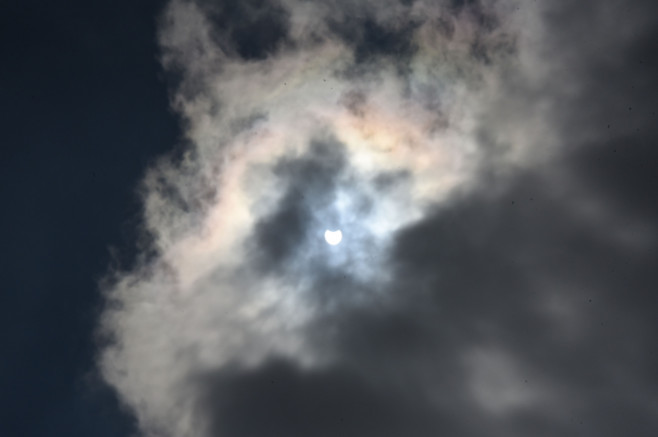 Rare rainbow around solar eclipse, London, UK - 10 Jun 2021