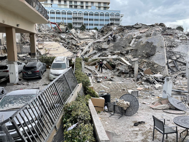 Oceanfront Miami Beach condo tower collapses leaving at least one dead.