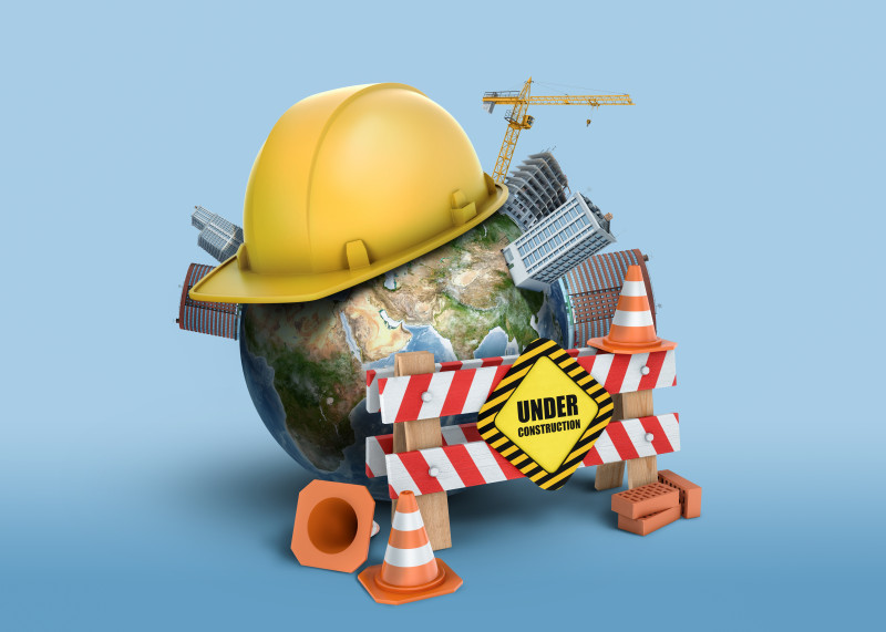 3d rendering of Earth globe, covered with a construction helmet, small buildings and with a fence with a sign Under Construction.