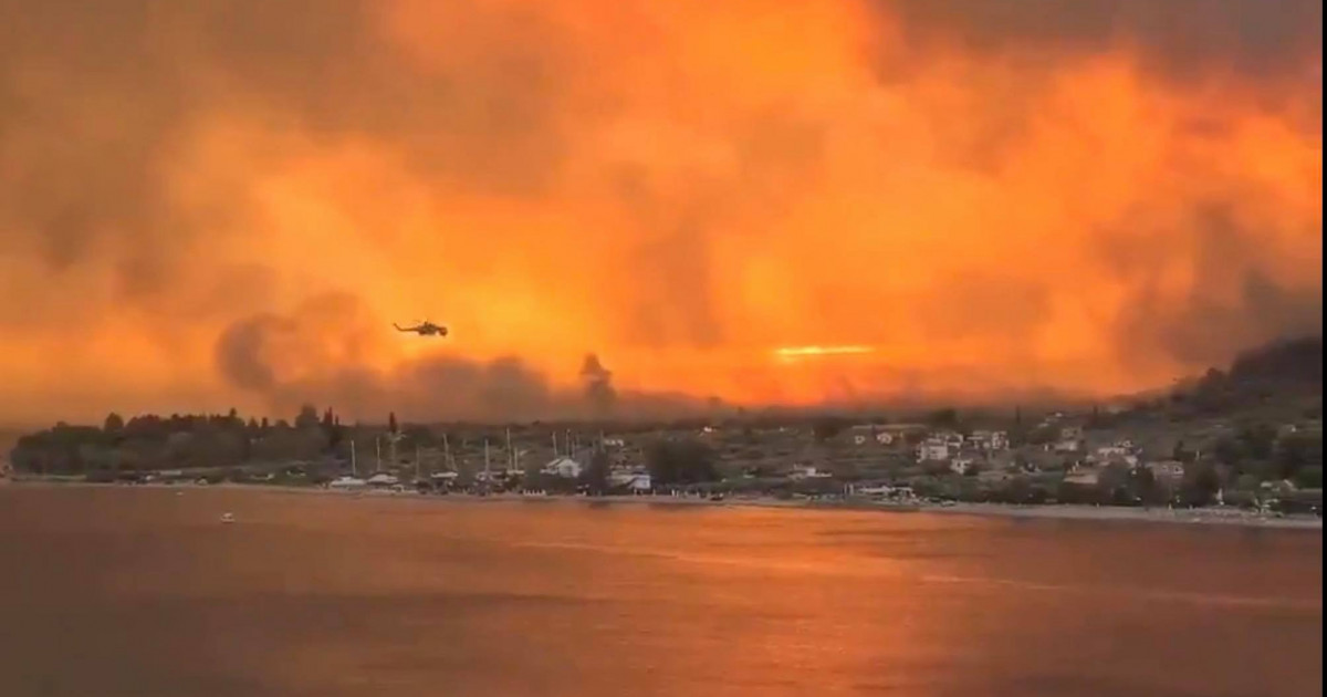 Φωτιά καίει ανεξέλεγκτη εδώ και αρκετές ημέρες στο δεύτερο μεγαλύτερο νησί της Ελλάδας.  Εκατοντάδες τουρίστες και κάτοικοι απομακρύνθηκαν