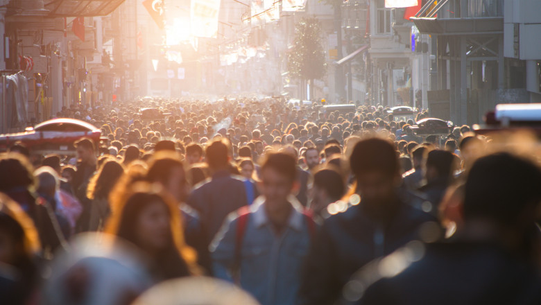 Blurred crowd of unrecognizable at the street