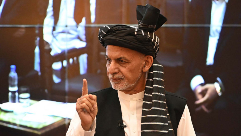 Afghanistan's President Ashraf Ghani gestures during a function at the Afghan presidential palace in Kabul