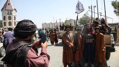Taliban fighters pose for a photo in Kabul, Afghanistan
