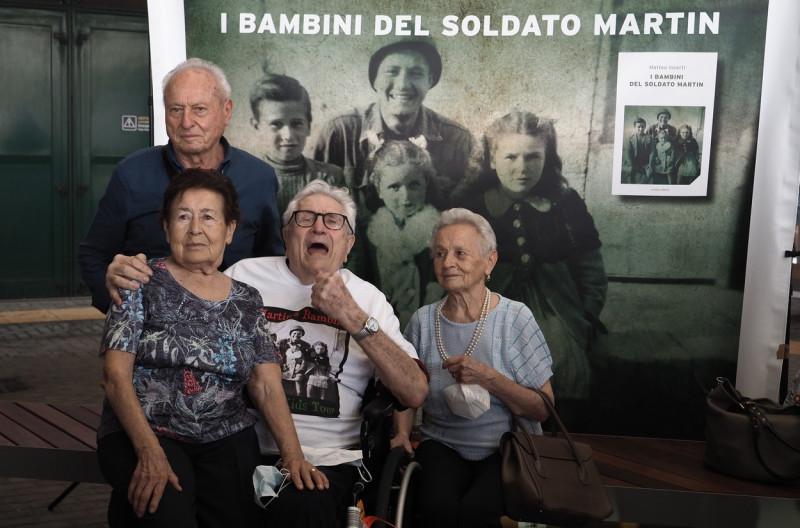 Italy: Bologna: The former American soldier Martin Adler meets the children saved by him in 1944