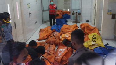 Police and hospital officials store body bags of dead victims at a morgue in a local general hospital in Tangerang on September 8, 2021, after a prison fire broke out and killed 41 inmates