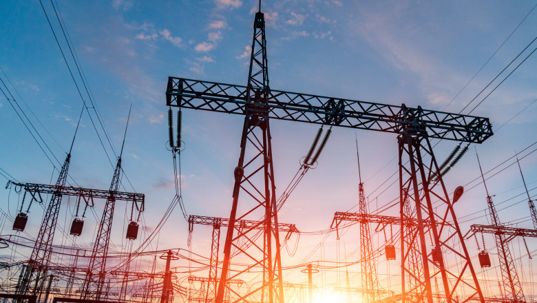 High-voltage power lines. Electricity distribution station. high voltage electric transmission tower. Distribution electric substation with power lines and transformers