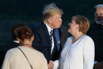 G7 - President Trump Kisses Chancellor Merkel