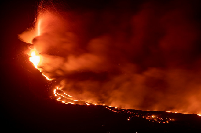 Lava reaching the sea in La Palma creates a low island more than half a kilometre wide