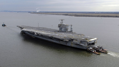 USS John F. Kennedy Towed To Navy Inactive Ships Maintenance Facility